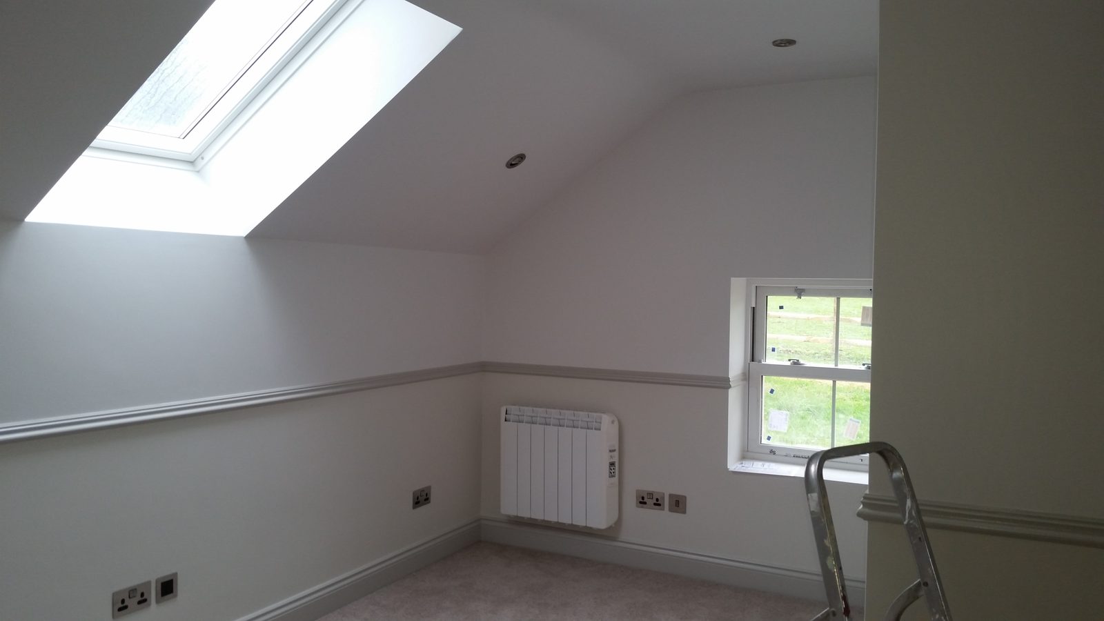 Finished loft room with dado rail and mouldings