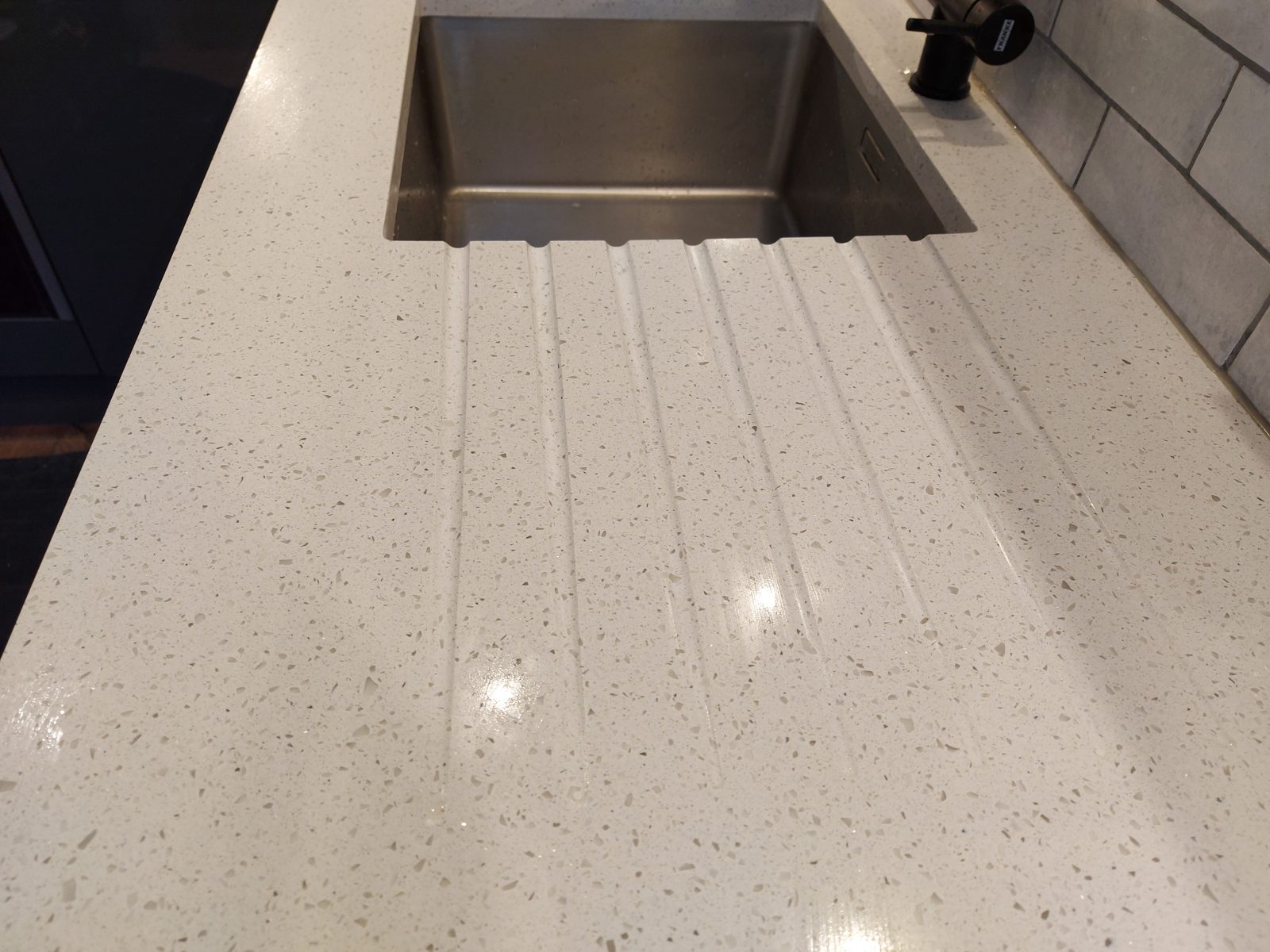 Drainer grooves cut at the sink: St John's Road kitchen project photo 19