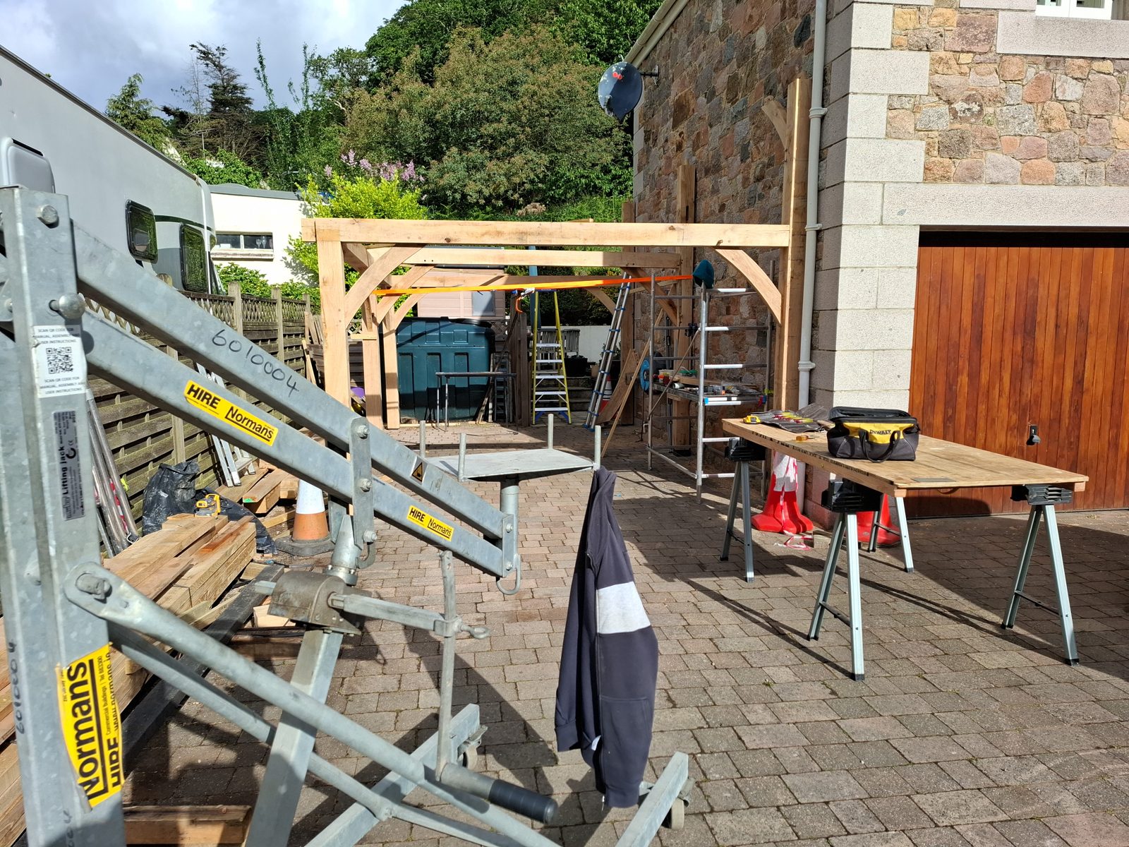 Post and beam frame going up: Oak carport in St Mary project photo 03