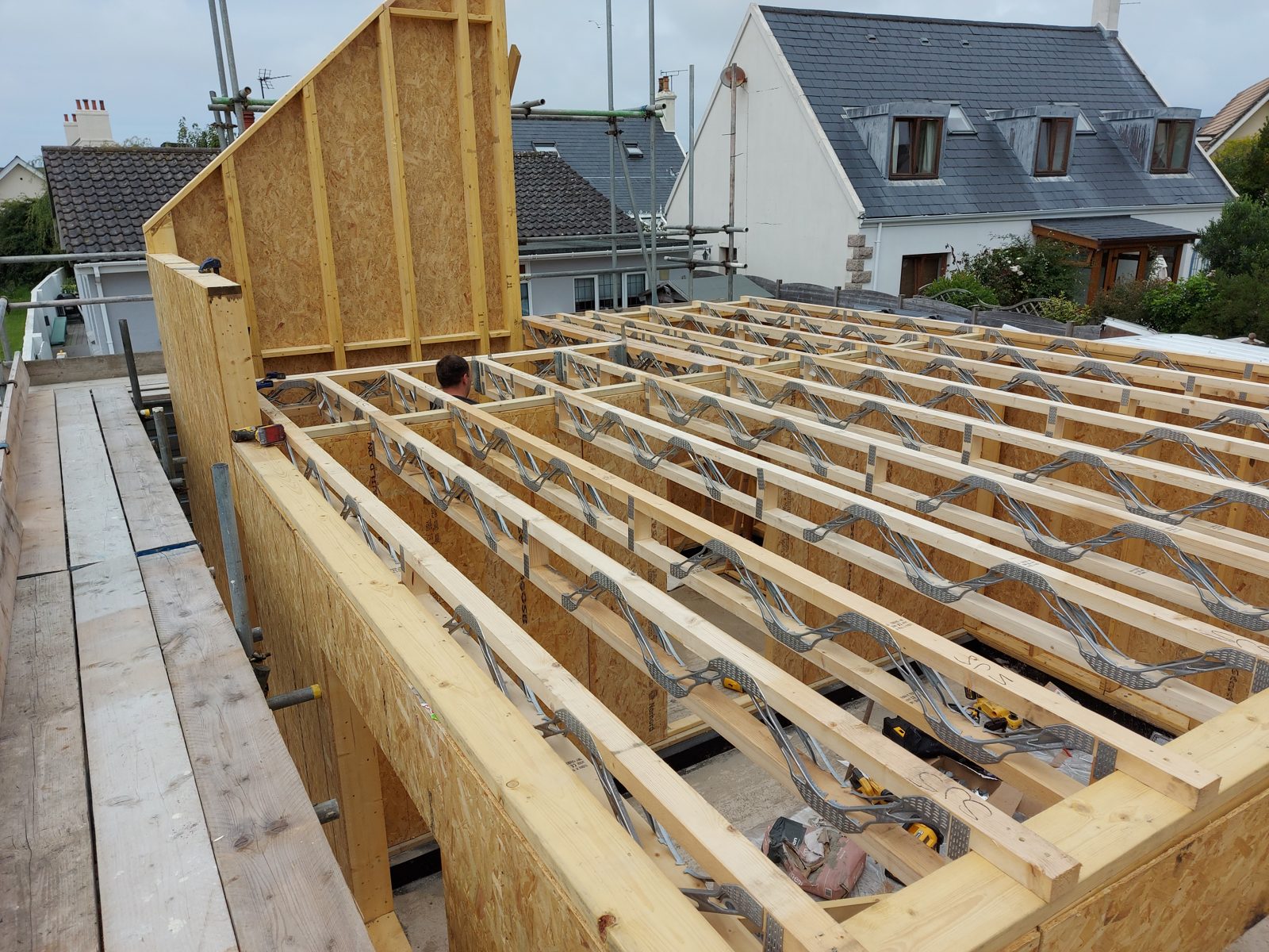 First gable panel up over the deck: Timber frame new build project photo 01