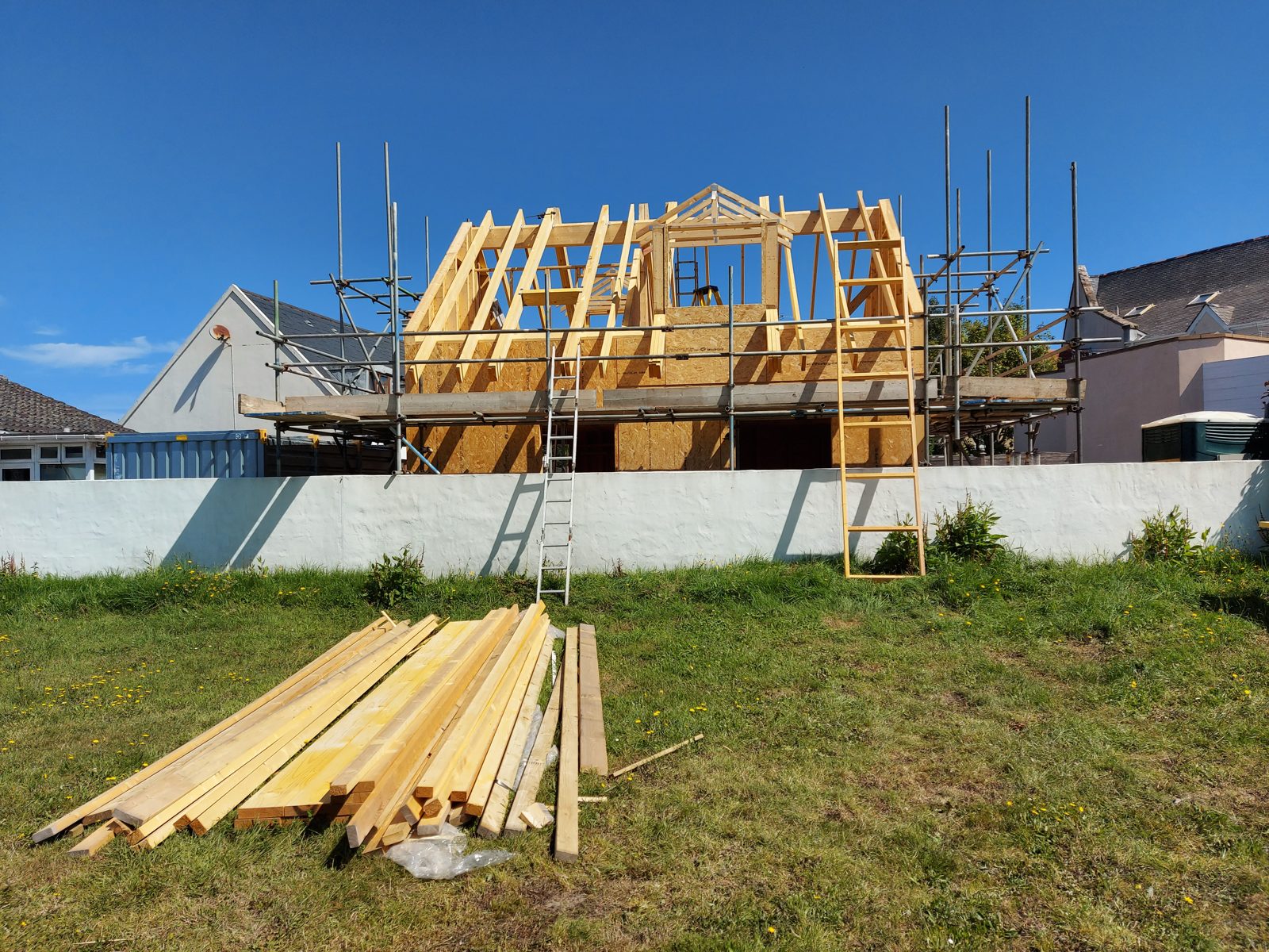 Trusses and dormer openings, front on: Timber frame new build project photo 11